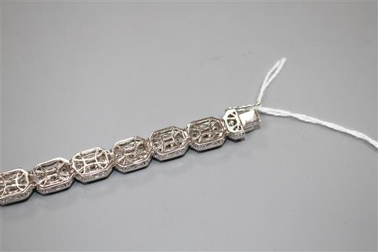 A modern 14k white metal and diamond encrusted octagonal link bracelet, 18.3cm, gross weight, 35.8 grams.